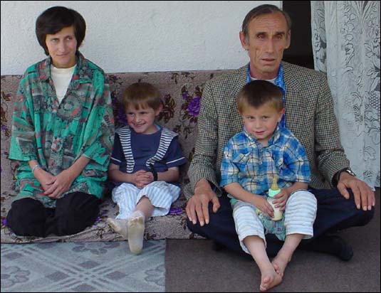 Arife Zejna. Girl Aged 7, now in USA for Lifesaving Surgery - Photo, her family in Kosovo, June 01 2002